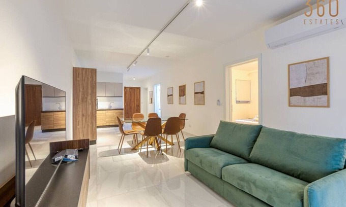 Qawra Apartment | Trendy 2BR Apartment with Terrace and Family Amenities