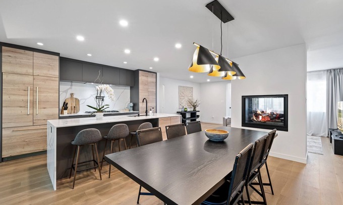 North Central House | Modern 4-Bedroom Masterpiece with Indoor Fireplace