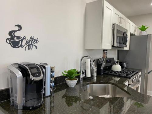 Lowell Apartment | Modern 3BR Retreat Near UMASS with Pet-Friendly Perks