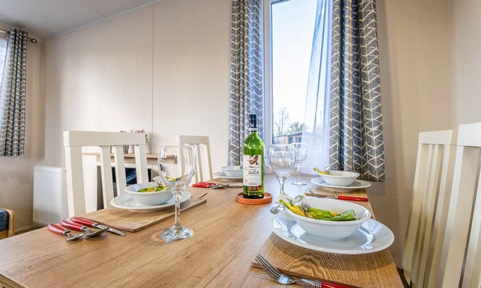 Milnthorpe House | Stylish Holiday Home with Pool at Fell End Park