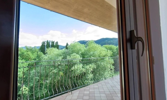 Scoppito Apartment | Modern Apartment Steps from Gran Sasso with Breakfast