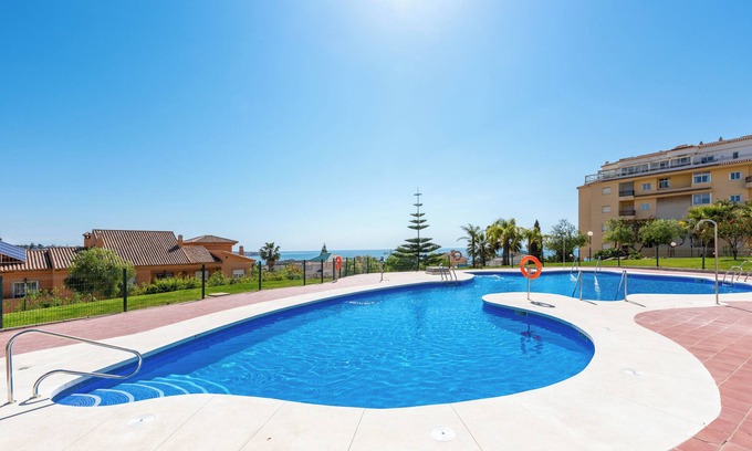 La Cala de Mijas Apartment | Modern Apartment with Ocean View, Pool & Garden Retreat