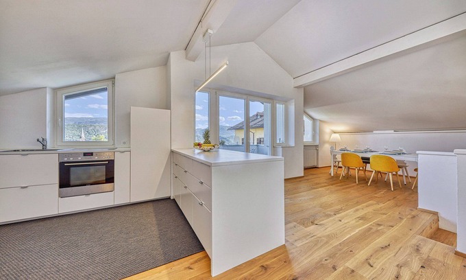 Caldaro Sulla Strada del Vino Apartment | Modern Apartment for Five with Panoramic Views and Private Garage in Caldaro