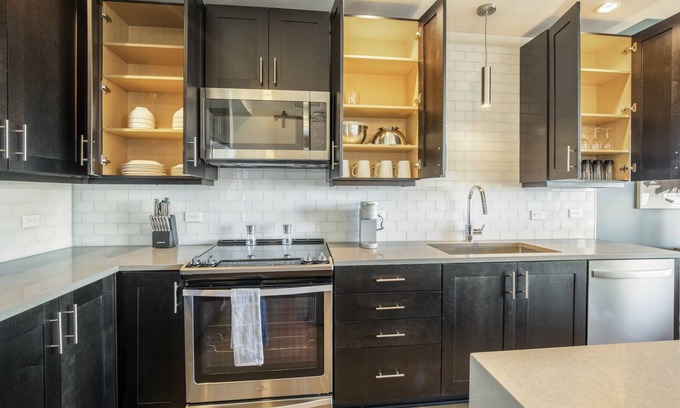 Uptown Apartment | Modern Apartment with Kitchen in Prime Location Awaits You