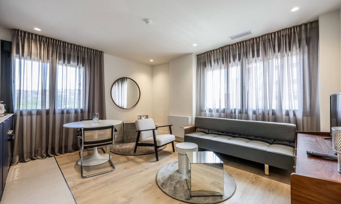 Puerta del Angel Apartment | Stylish Apartment Steps from the Royal Palace Awaits You