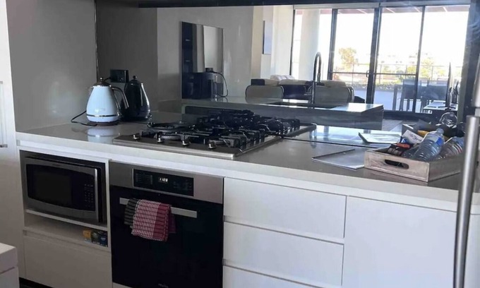 Kogarah Apartment | Bright Beachside Retreat with Balcony and Spa Amenities