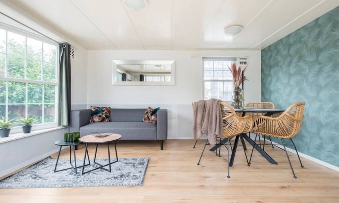 Oisterwijk Ski Chalet | Modern Chalet in Oisterwijkse Bossen with Family Amenities