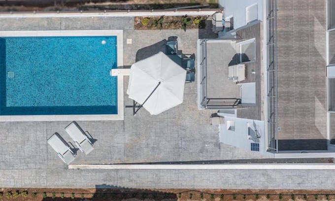 Isthmia Villa | Bright Oceanfront Villa in Corinth with Pool & Pet-Friendly