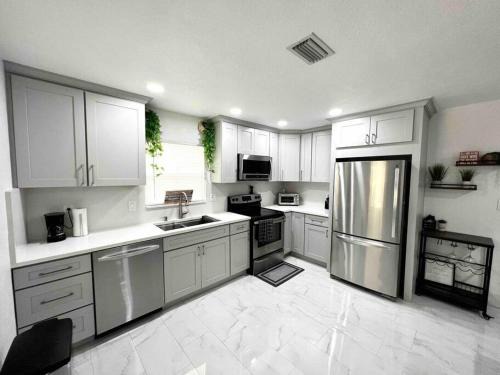 Citrus Park House | Modern Cozy Retreat with Pool and Expansive Backyard