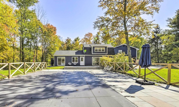 Marble Dale House | Inviting Modern Retreat with Fire Pit Near Lake Waramaug