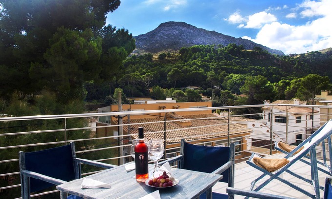 Cala San Vicente Apartment | Cozy Flat with Mountain Views & Terrace, Steps from Beaches