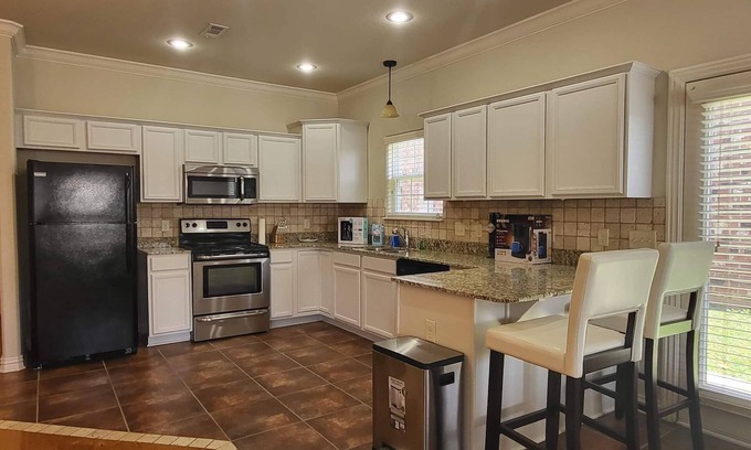 Lowell House | Stylish Home in Lowell: Perfect for Families with Kitchen