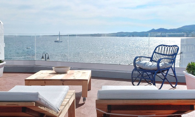 Arrieta Apartment | Oceanfront Retreat in Arrieta with Spa and Kitchen Amenities
