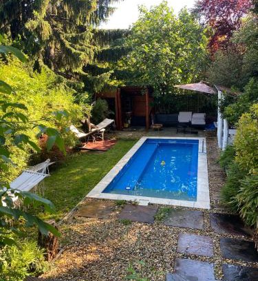 Gellert Hill Apartment | Modern Oasis with Pool and Ocean View in Central Location