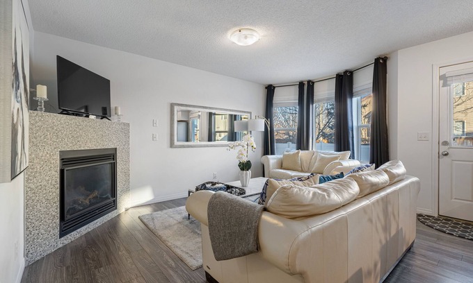 Southwest Calgary House | Stylish Retreat with Private Backyard & Hot Tub Awaits