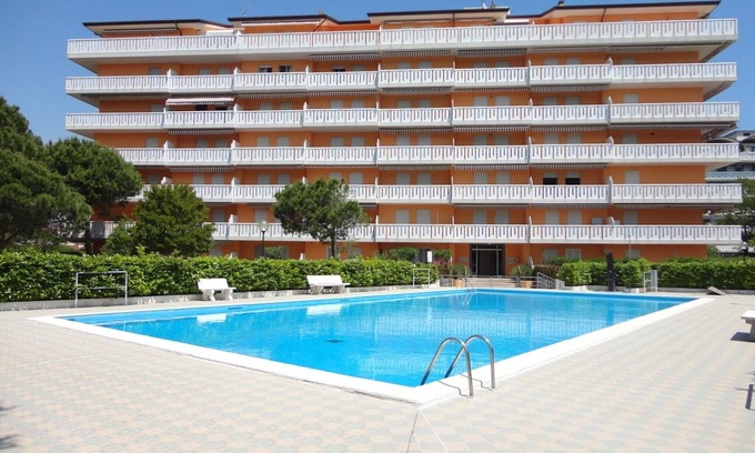 Porto Santa Margherita Apartment | Contemporary Seaview Apartment with Pool and Pet-Friendly Perks