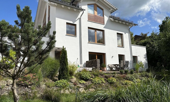 Konigsdorf Apartment | Sunlit Terrace with Garden, Rated 10/10 for Guest Comfort