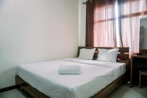 Pluit Apartment | Chic 1BR Condominium Apartment in Green Bay by Travelio