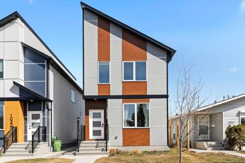 Jasper Place House | Modern Home with King Bed and Arcade Fun for Families