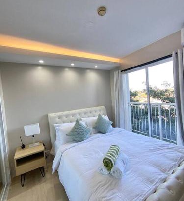 Moonwalk Apartment | Relax in a Modern Oasis with Pool and Netflix Access