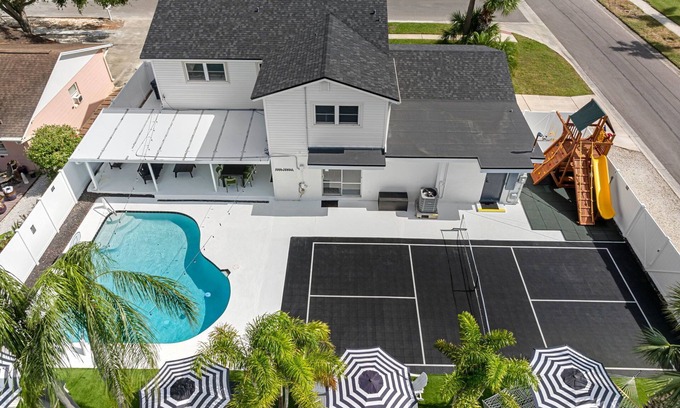 Town N County Park House | Modern Paradise: Poolside Bliss with Pickleball Fun
