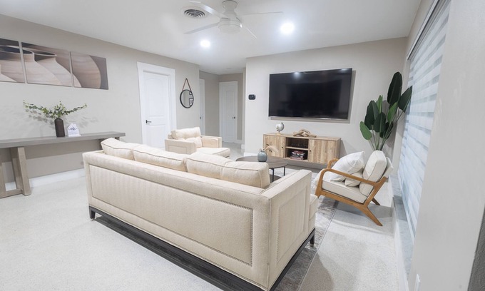 Garden Isles House | Stylish Poolside Retreat Steps from Beach and Golfing