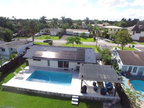Davie Villa | Inviting Pool Home by the Lake, Close to Hardrock FLL