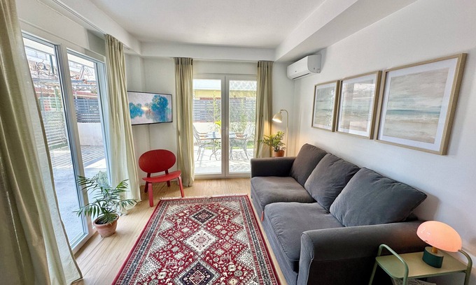Olymbiaki Akti Apartment | Modern Seaside Retreat with Private Patio for Families