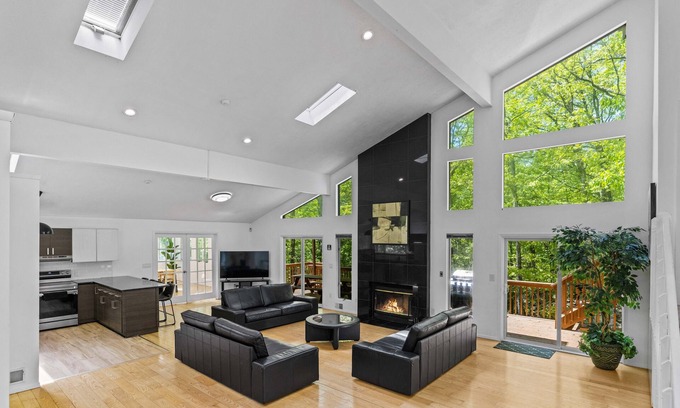 Bushkill House | Contemporary Streamfront Retreat with Spa and Hot Tub