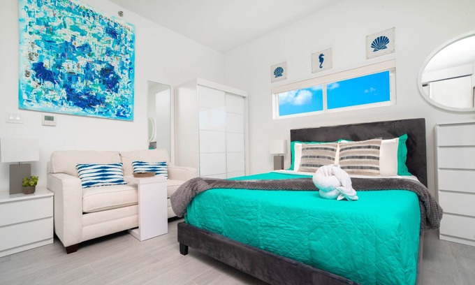Seven Mile Beach Apartment | Experience The Grove 1BR Apt with Rooftop Pool & Ocean View