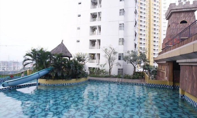 Panunggangan Utara Apartment | Stylish Grand Serpong Studio with Pool & Family Amenities