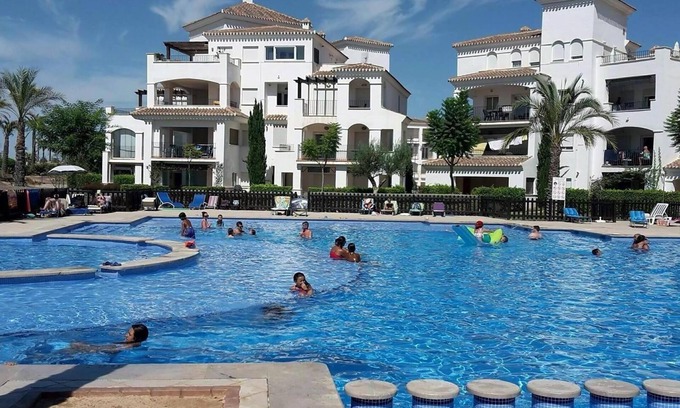 Roldan Apartment | Family-Friendly Apartment with Pool & Scenic Golf Views