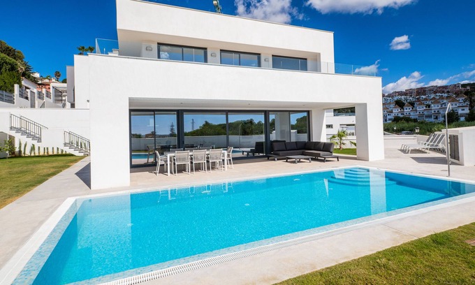 Castillo de Sabinillas Villa | Modern Villa Steps from the Beach with Oceanfront Views