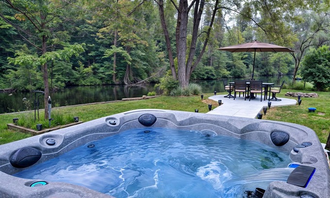 Isaacs Glen House | Modern Waterfront Cottage with Hot Tub and Pool Table