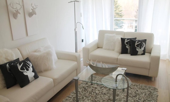 Lam Apartment | Contemporary Retreat with Balcony, Spa & 10/10 Guest Rating