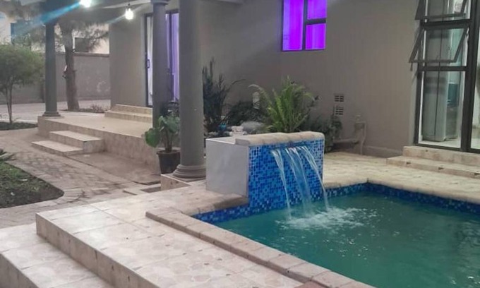 Kadoma Apartment | Modern Standard Room with Queen Bed & Breakfast Included