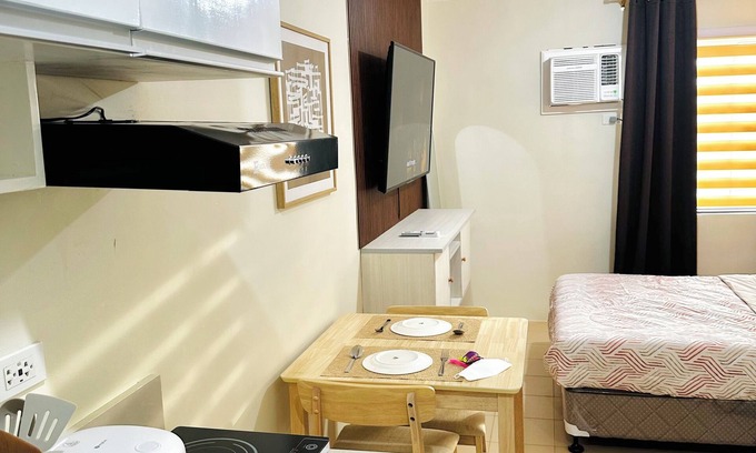 Dumaguete Condo | Modest Condo Getaway, Sea & City Access
