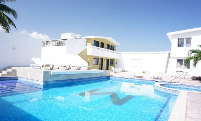 Chicxulub Puerto Apartment | Guest Favorite: Moka Hospedaje with Pool and Spa Amenities