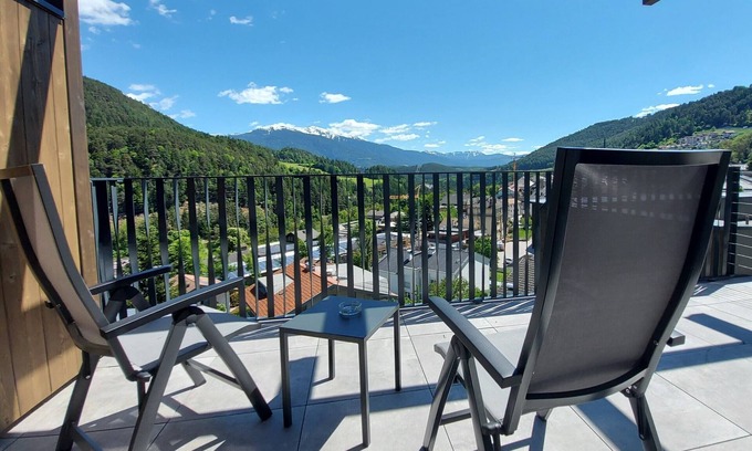 Muhlbach Hotel | Discover Molaris Lodge: Family-Friendly Retreat with Spa