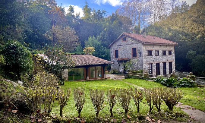Entrambasaguas House | Molino - Fuente del Francés: Family Retreat by the Water