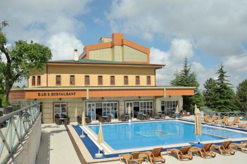 Nevsehir Hotel | Inviting Monark Hotel Cappadocia: Pool, Spa & Scenic Views