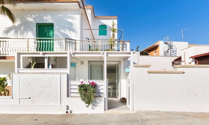 San Pietro in Bevagna Apartment | Experience Comfort at 2184 Mono Chicca Blu with Ocean Views
