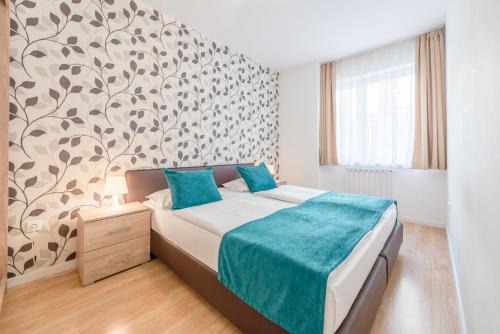 Corvin negyed Apartment | Explore Prince Downtown Apartments with Free Parking