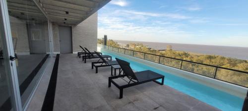 Olivos Apartment | Cozy River View Studio with Pool and Oceanfront Access