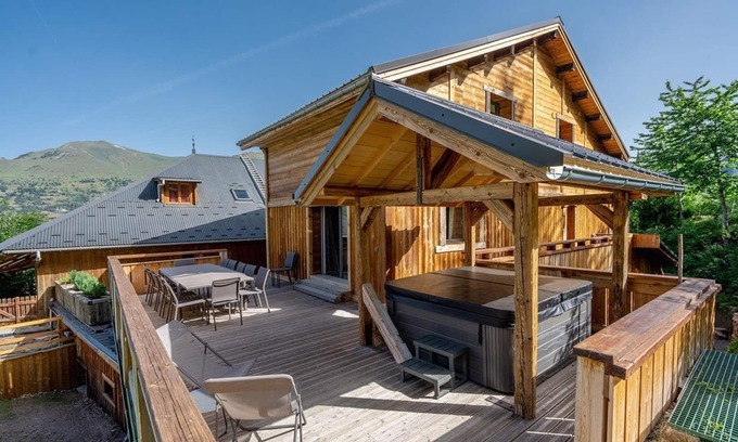 Mont-de-Lans Ski Chalet | Relax at Mont-de-Lans Chalet with Terrace & Hot Tub