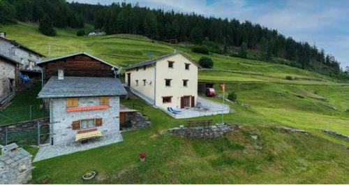 Poschiavo House | Discover Monte Campell Dasura: Pet-Friendly Family Retreat