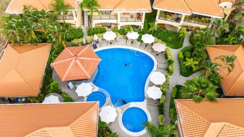 Jaco Hotel | Elegant Monte Carlo Condominiums with Pool & Hot Tub