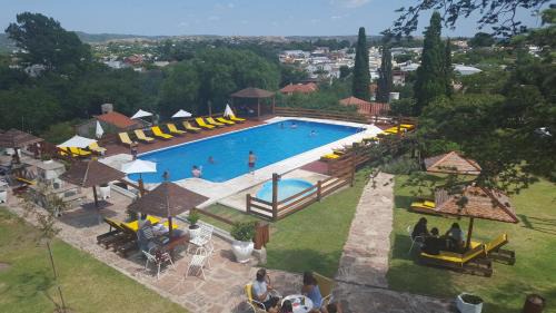 Capilla del Monte Hotel | Budget-Friendly Montecassino with Pool & Hot Tub Access