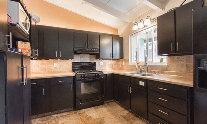 Mescal Corridor NW House | Inviting Monterey Craftsman Home with Unique Amenities