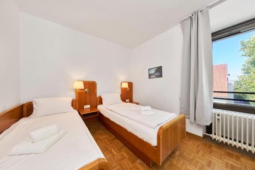 Straubing Apartment | Monteurzimmer für bis zu 26 Personen in Straubing low budget mit Gemeinschaftsküche NEU